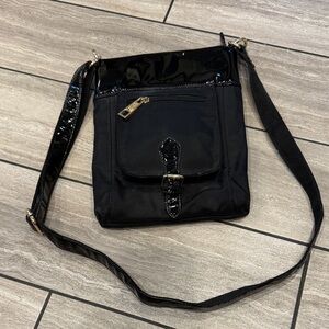 Elegant Black Crossbody Bag with Patent Accents